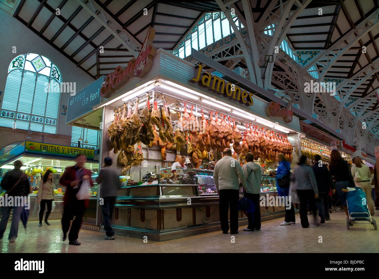 'Mercado Central (central market) in Valencia, Spain, one of the largest indoor markets in Europe', stall selling cured ham Stock Photo