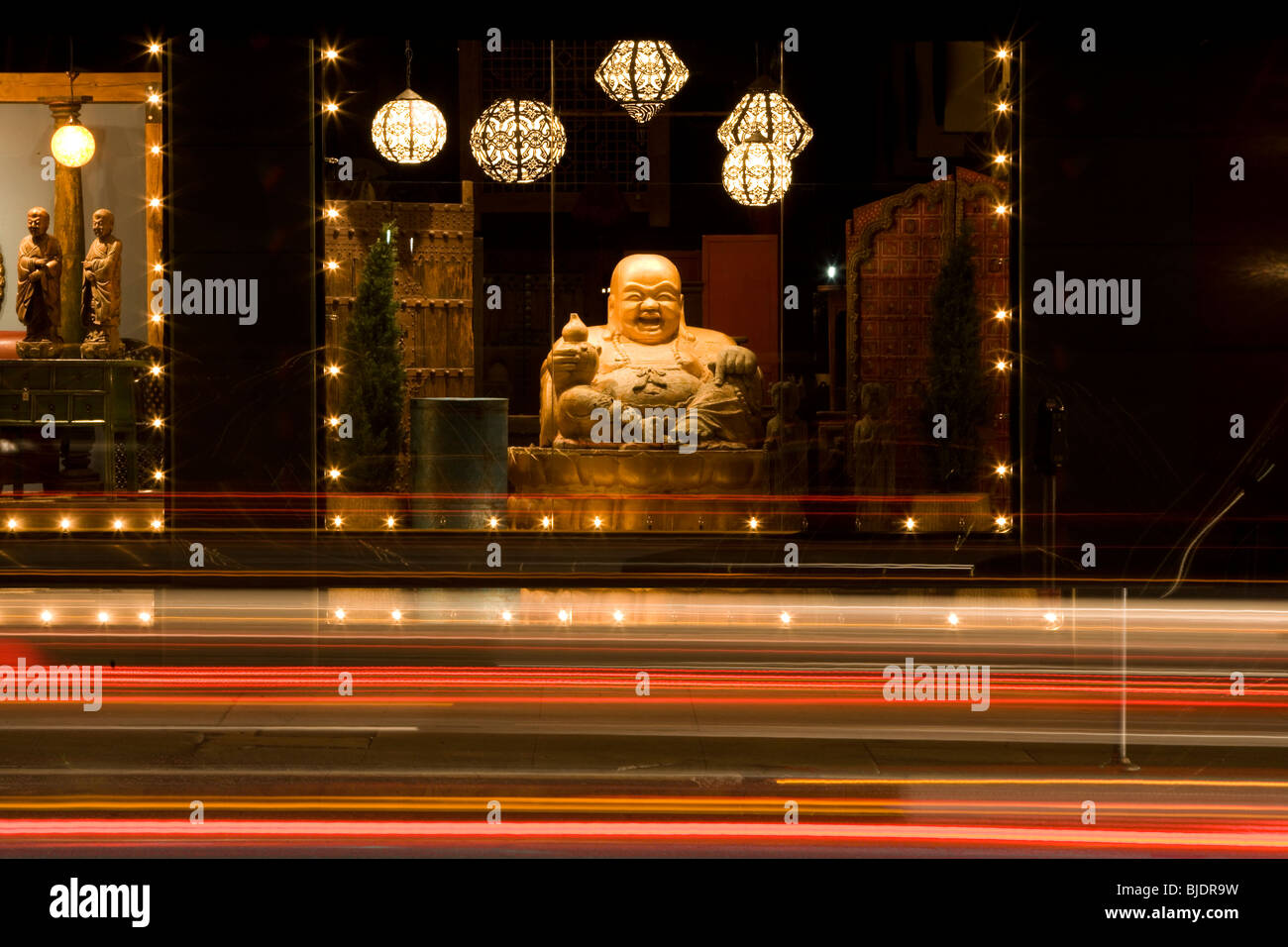 A budha sculpture in a shop window, Los Angeles County, California, United States of America Stock Photo