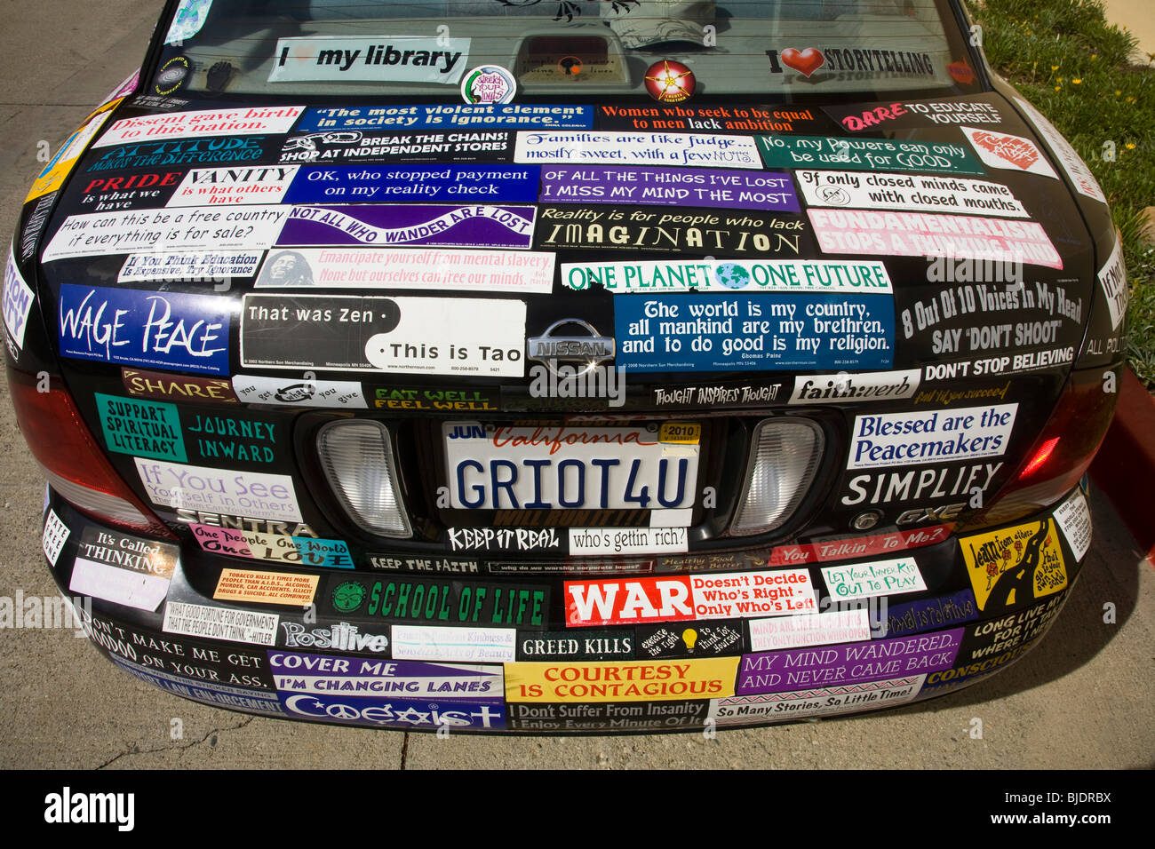 a-car-covered-with-bumper-stickers-inglewood-los-angeles-county-california-BJDRBX.jpg