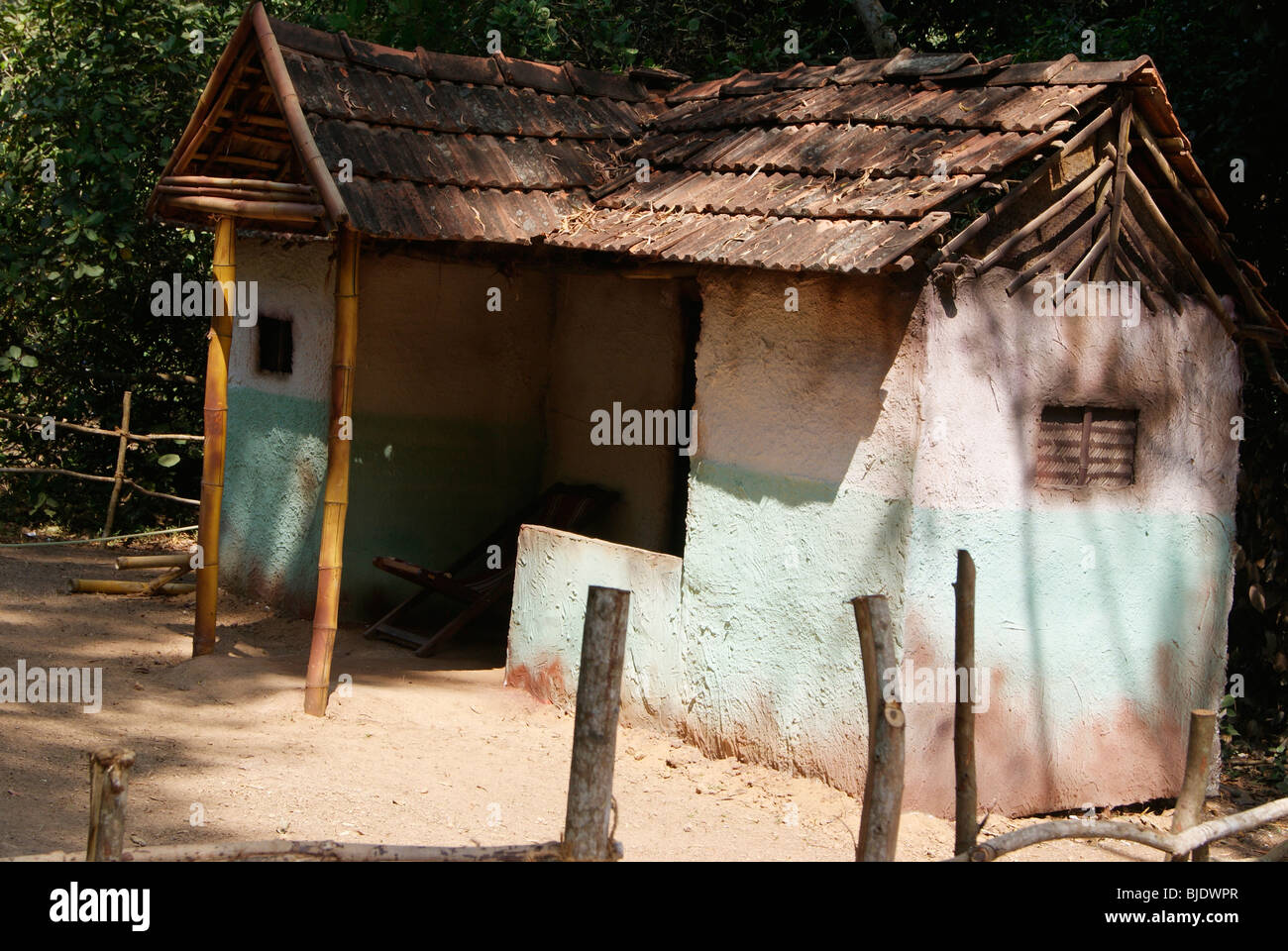 Poor Hut Home Built up of Clay,bamboo and Roofs with Natural Clay Tiles.scene from Kerala India Stock Photo