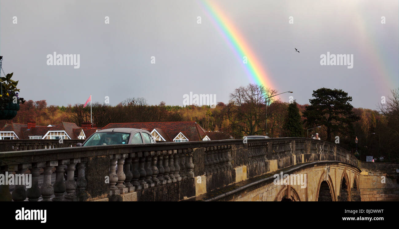 Rainbow arching above the bridge over the River Thames at Henley on Thames Oxfordshire England UK Stock Photo
