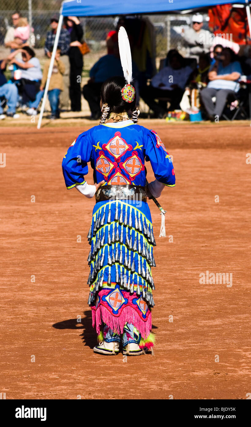Native American dancers in traditional regalia perform during a Pow Wow. Stock Photo