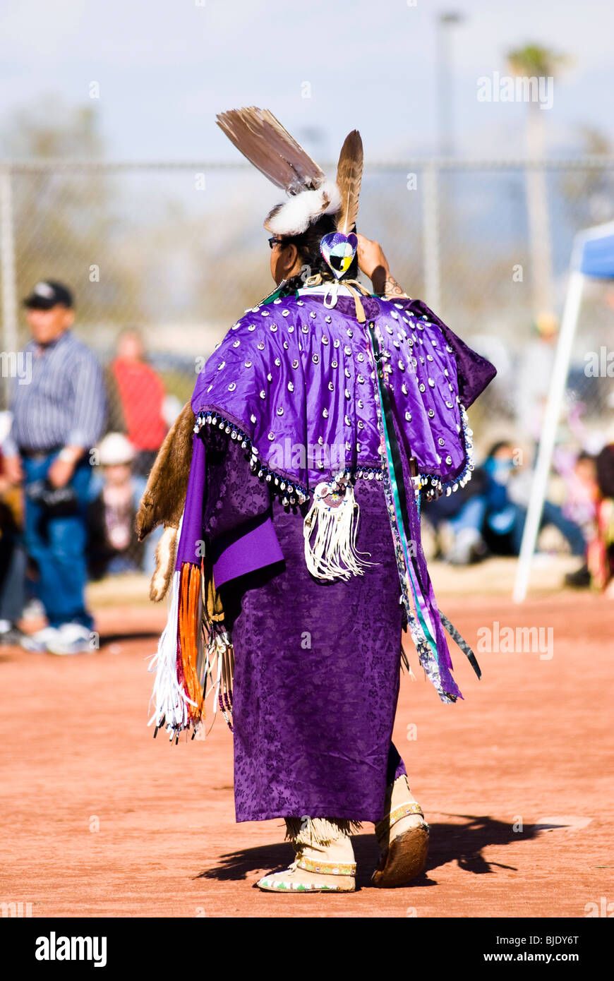 Native American dancers in traditional regalia perform during a Pow Wow. Stock Photo