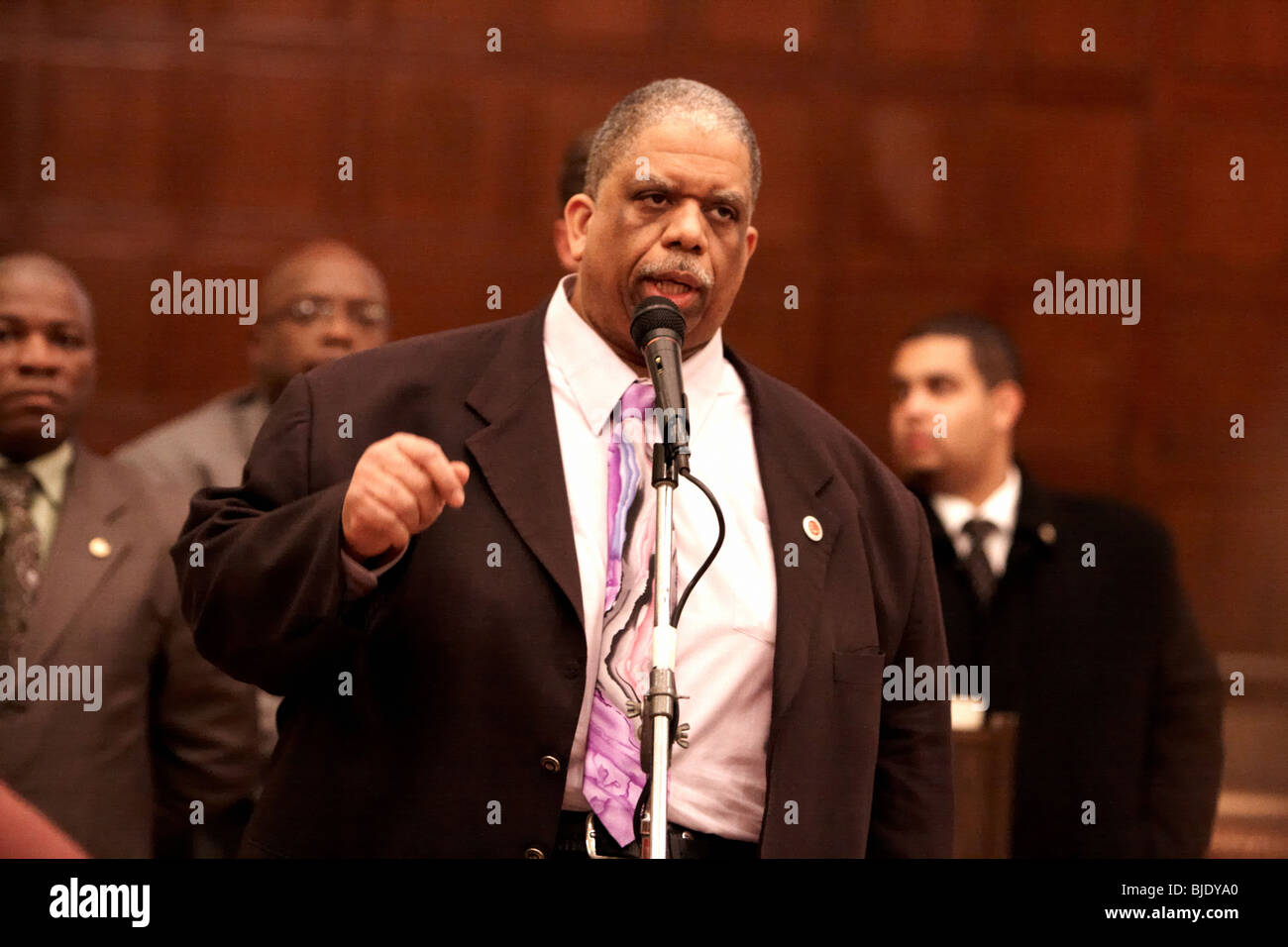 Leroy Comrie, representative for NYC Council District 27, attends a meeting to denounce the closing of Jamaica High School. Stock Photo