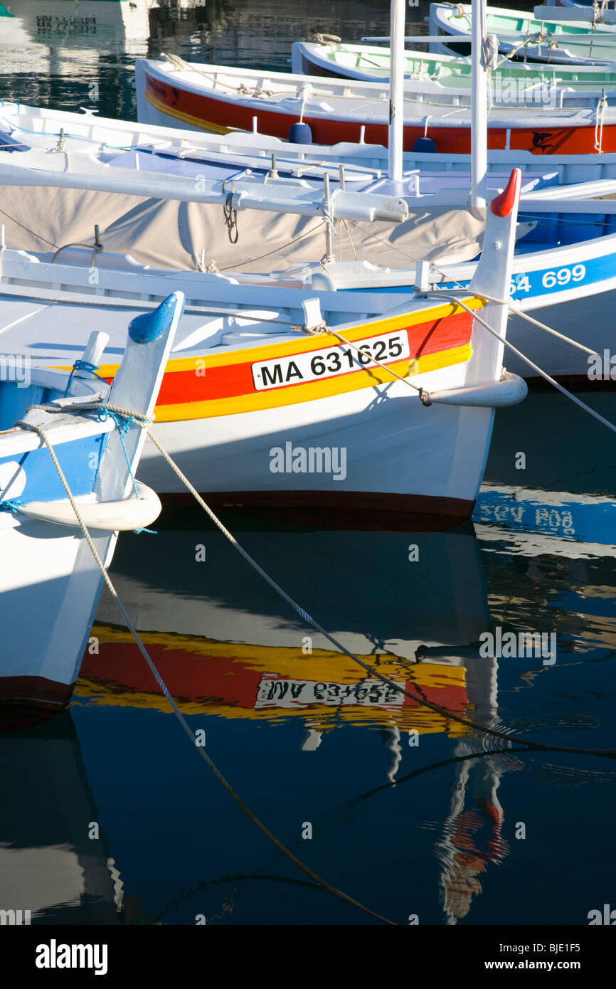 Multi coloured multi colored fishing boats hi-res stock photography and ...
