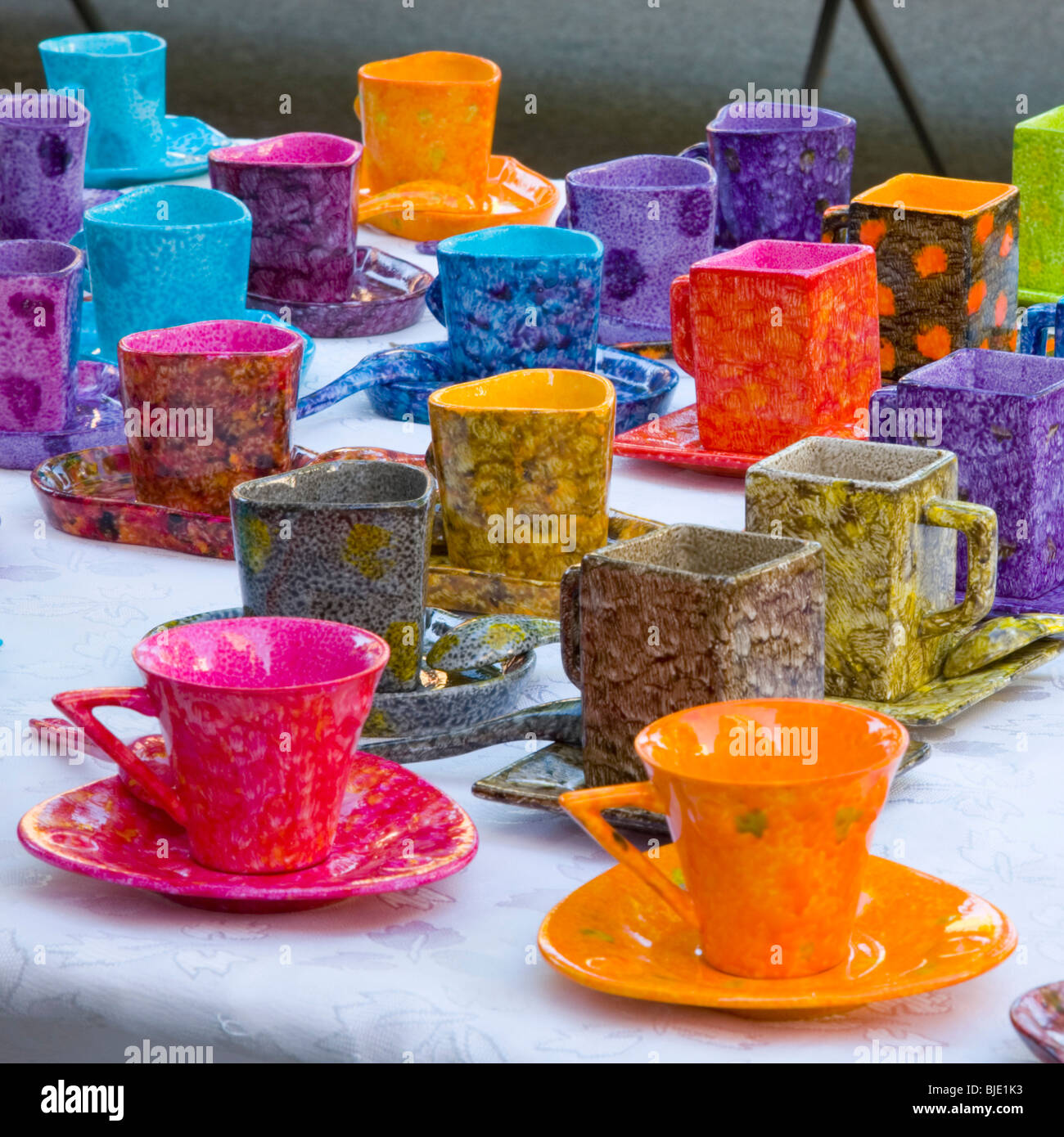Cassis, Provence, France. Colourful cups and saucers for sale on market. Stock Photo