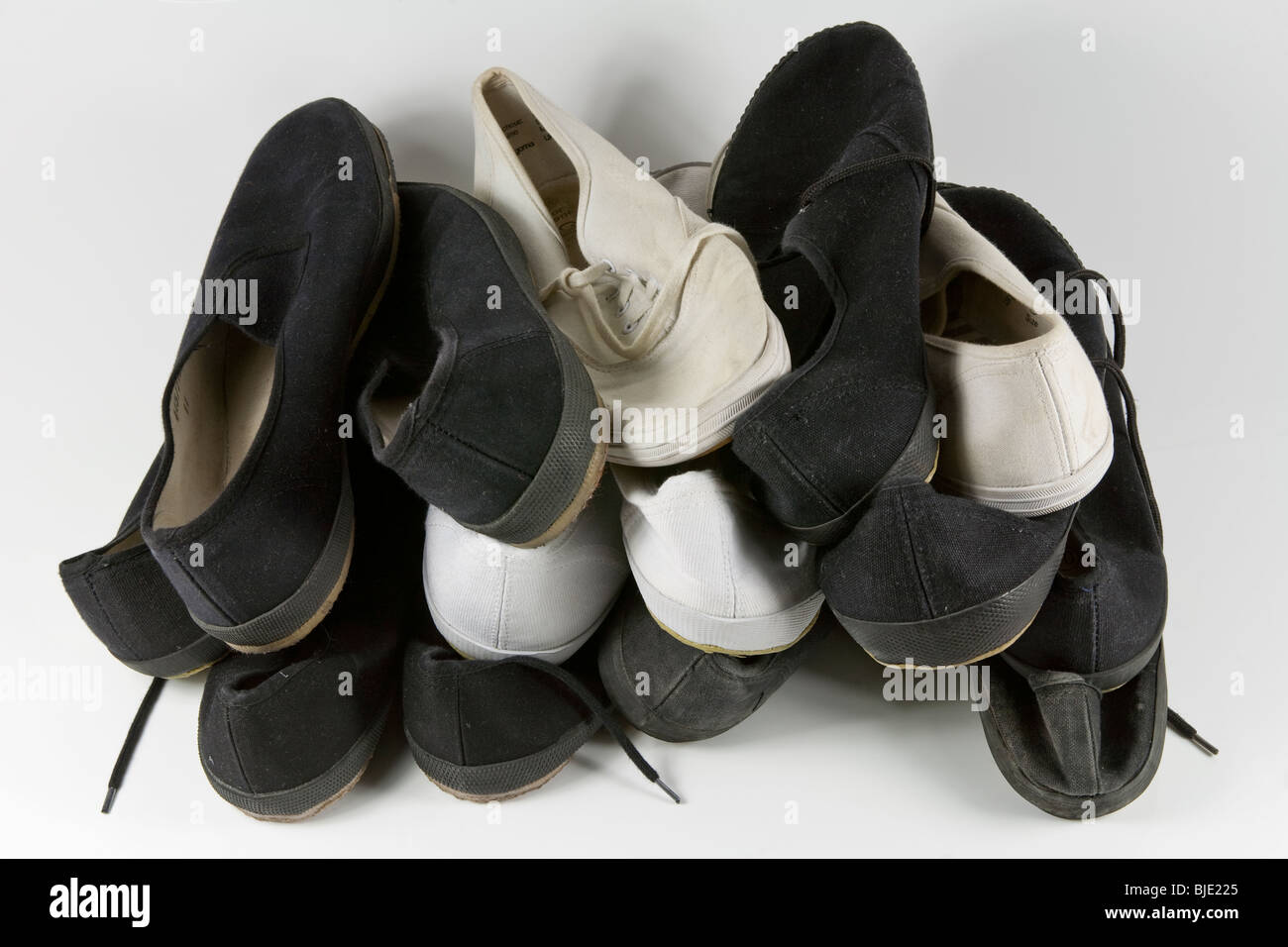 white slip on plimsolls