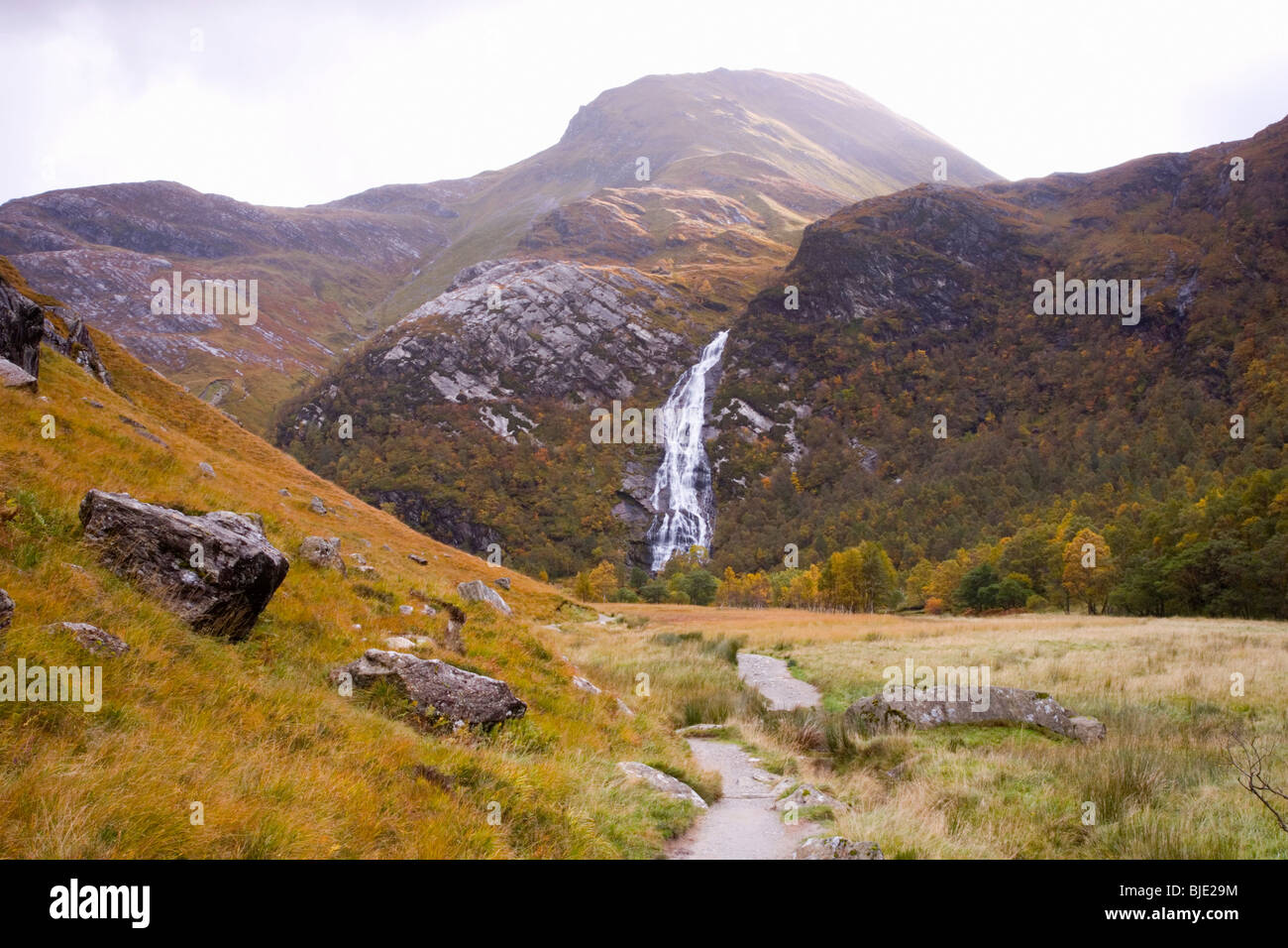 Glen Nevis, Highland, Scotland. View to Steall Waterfall and the peak of An Gearanach at the head of the glen, autumn. Stock Photo