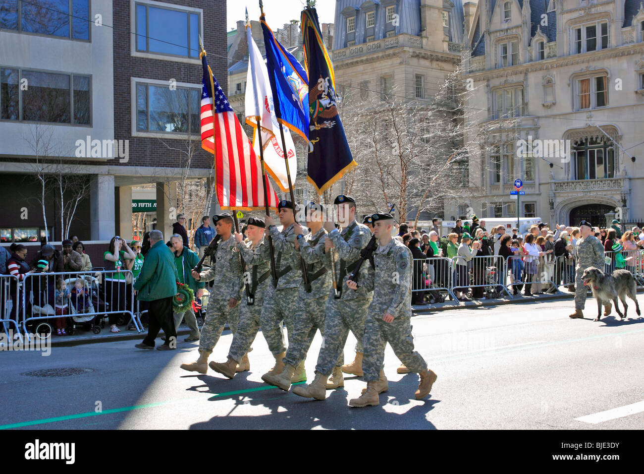 Military honor guard marches up 5th Ave. in St. Patrick's Day parade 5th Ave. Manhattan New York City Stock Photo