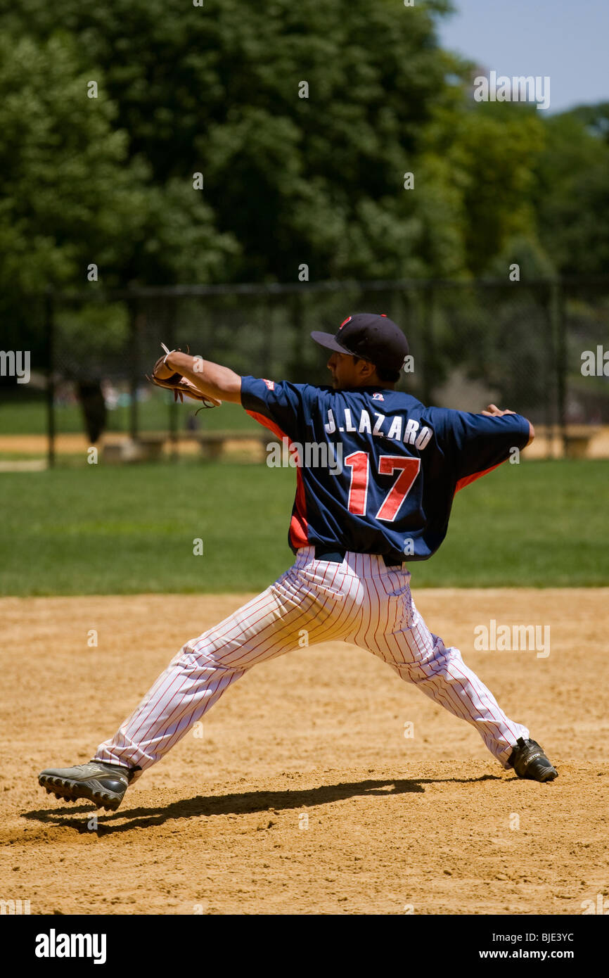 Baseball Player.  Pitcher on the mound throwing a baseball. Stock Photo