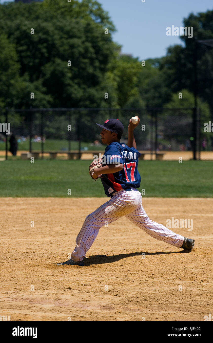 Baseball Player.  Pitcher on the mound throwing a baseball. Stock Photo
