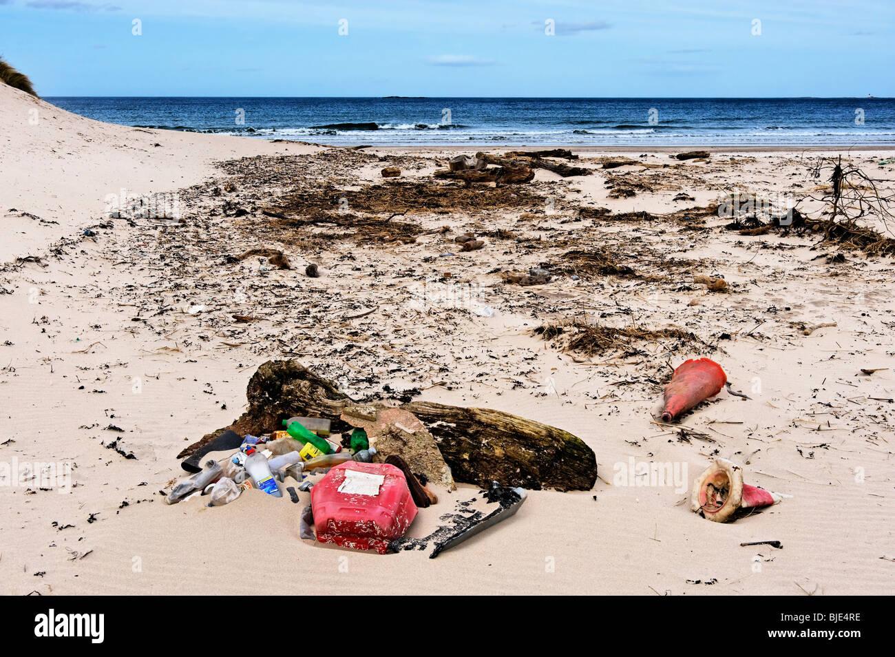 Plastic litter on a beach Stock Photo