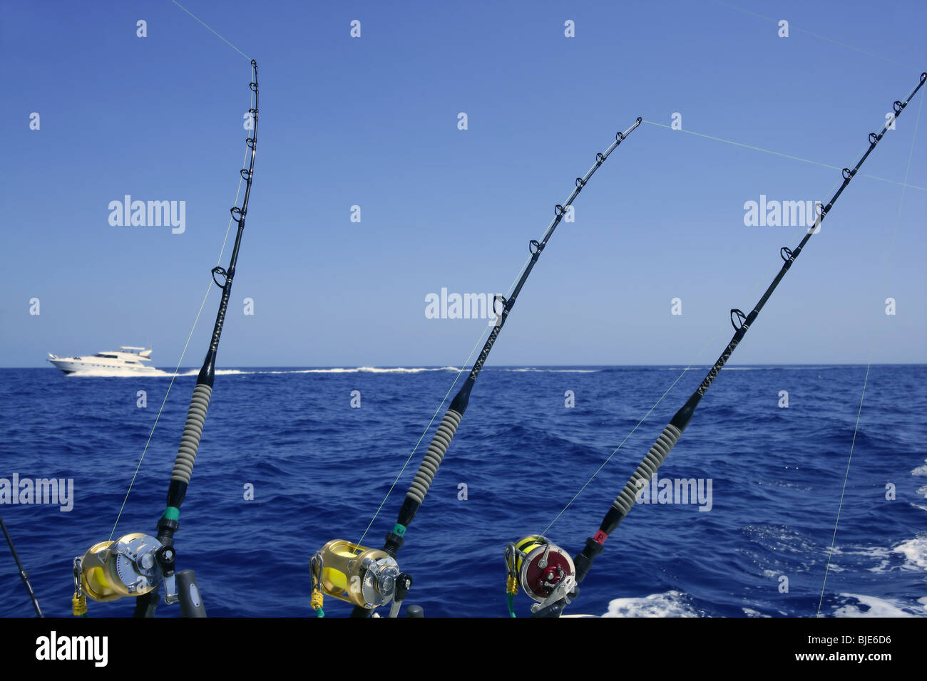 Blue sea and sky in a big game tuna fishing day rods and reels on boat  Stock Photo - Alamy
