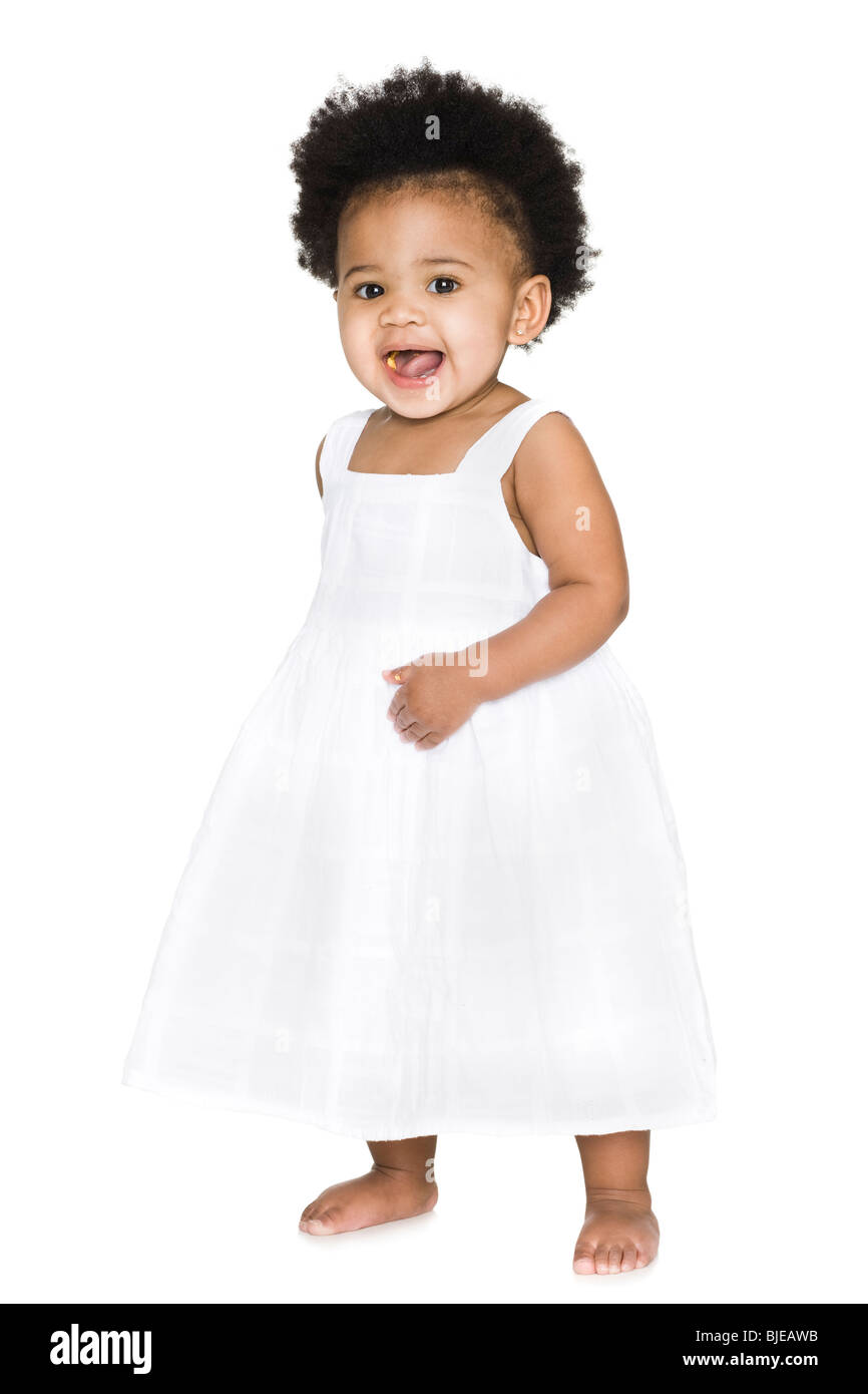 Baby in a white dress Stock Photo Alamy