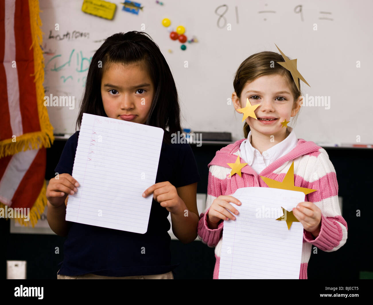 two girls in a classroom Stock Photo - Alamy