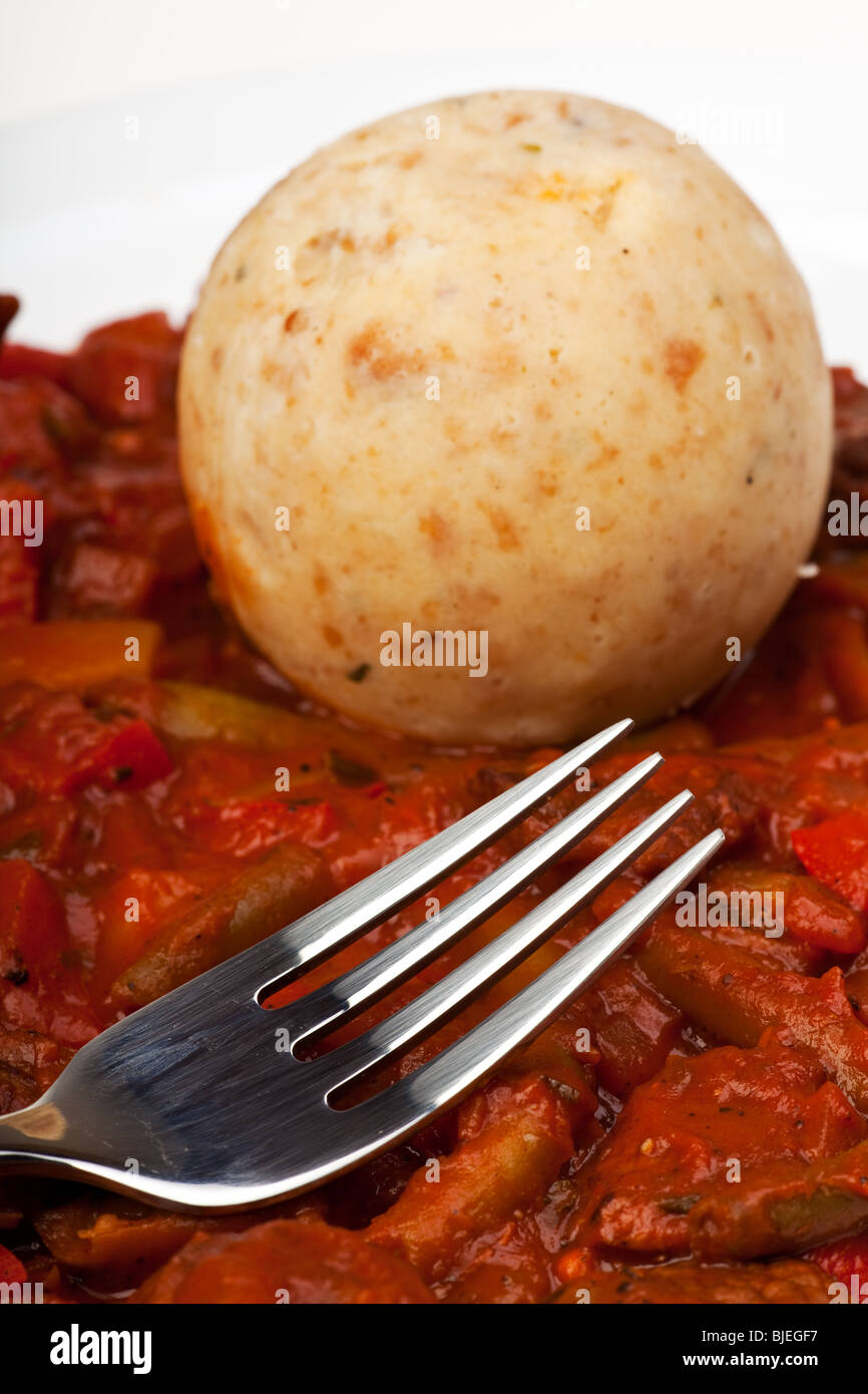 hungarian goulash and bread dumpling with a fork Stock Photo Alamy