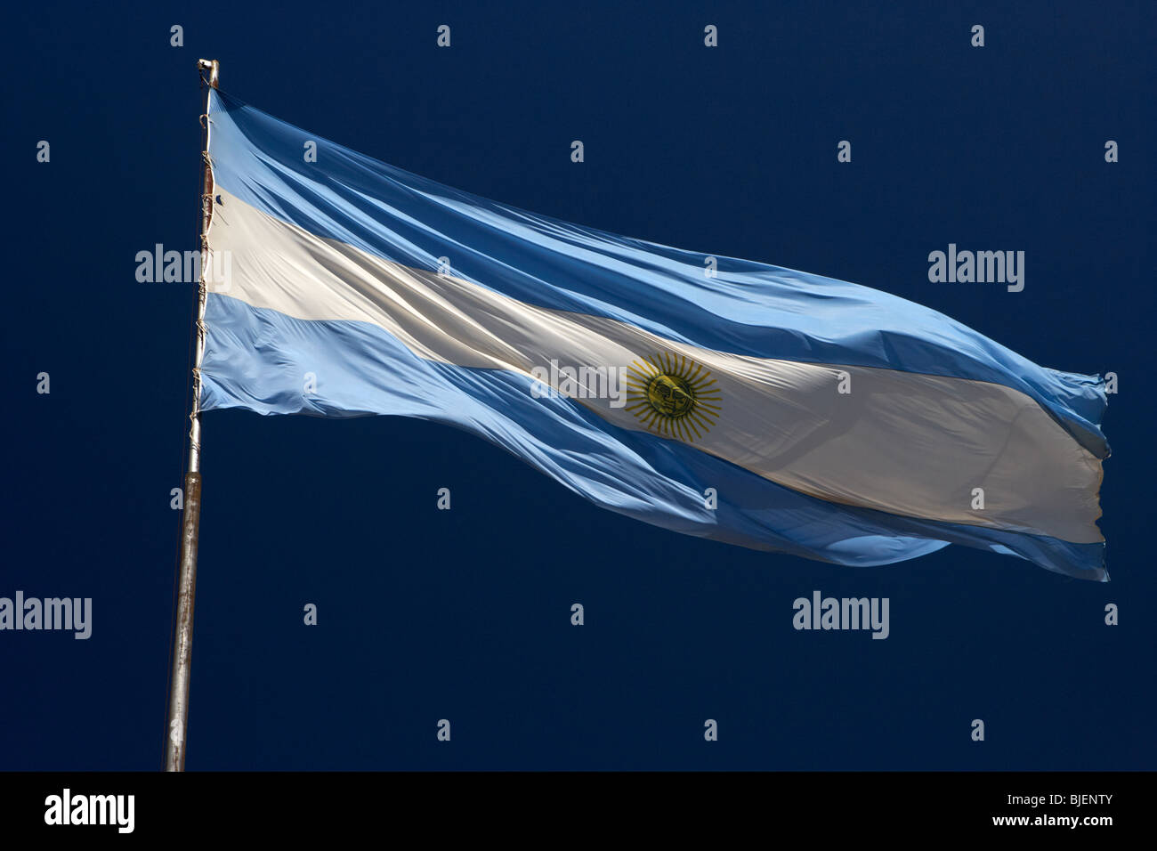 large argentinian flag flying in the wind against a blue sky republic of argentina, south america Stock Photo