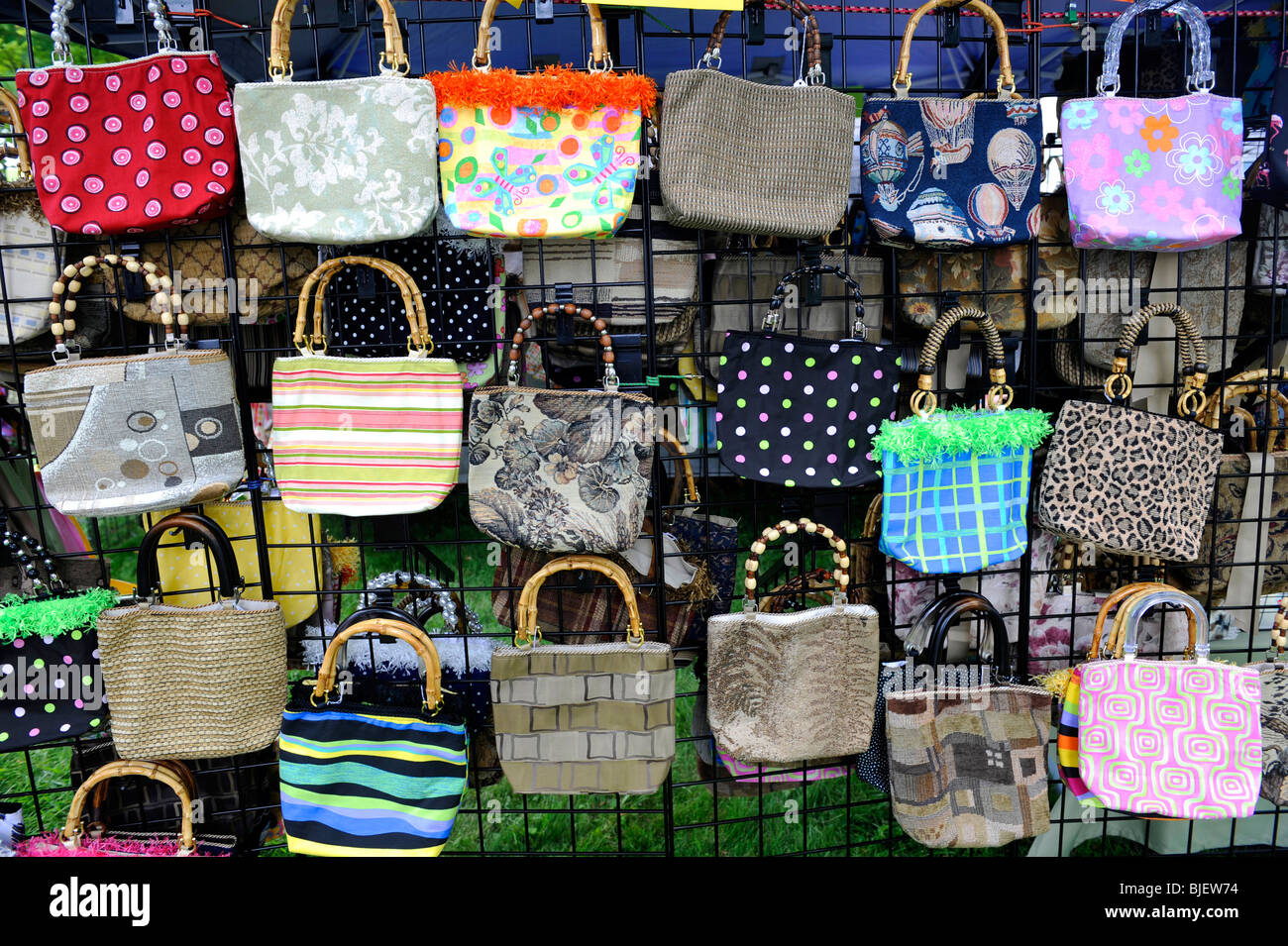 Pattern of purses on display at outdoor local craft fair Stock Photo