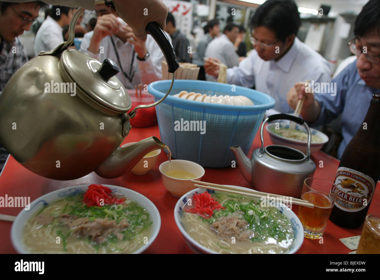 Eating ramen noodles in a ramen restaurant, a speciality of Fukuoka