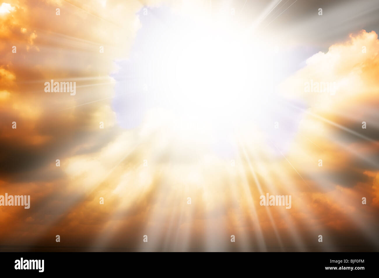 Heaven sky background with sun light and clouds Stock Photo