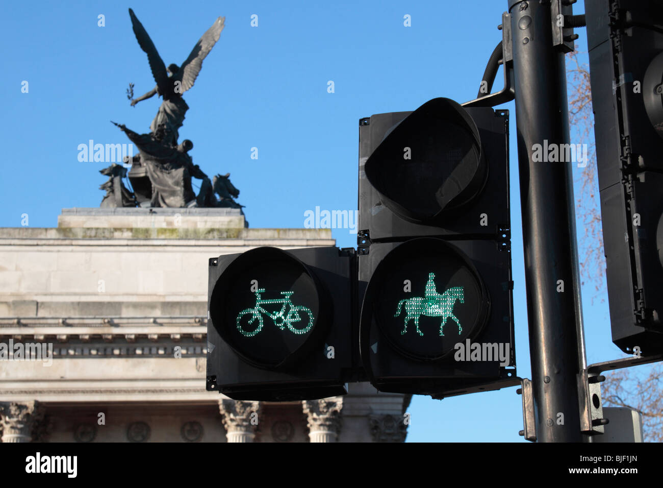 Pedestrian crossing lights including lights for cyclists and horse riders. Green Park, Wellington Arch, London, UK. Stock Photo