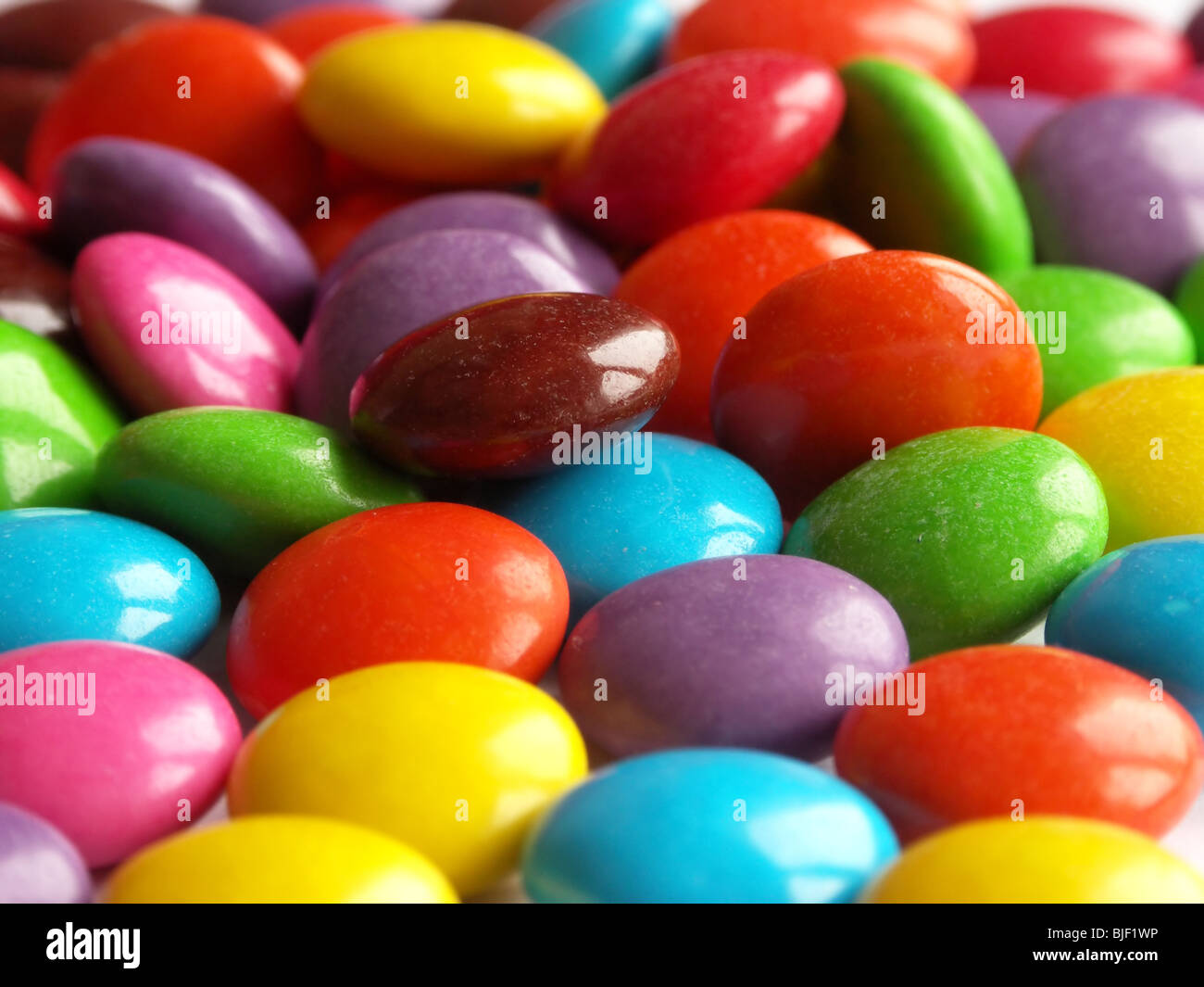 Many colors of sweet candys Stock Photo - Alamy