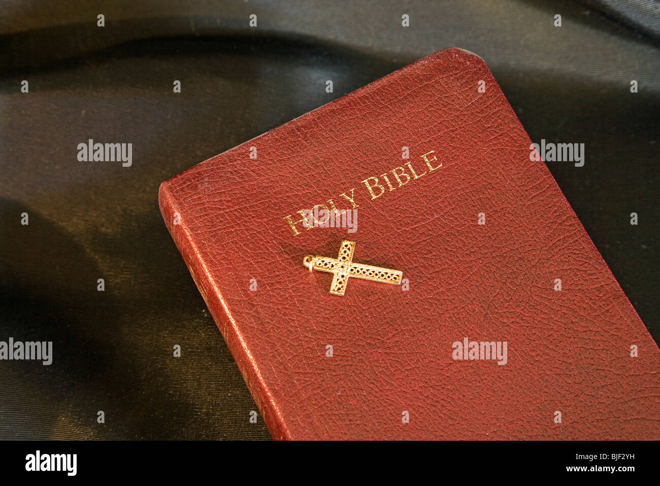 The Holy Bible, King James Version, and a gold cross Stock Photo