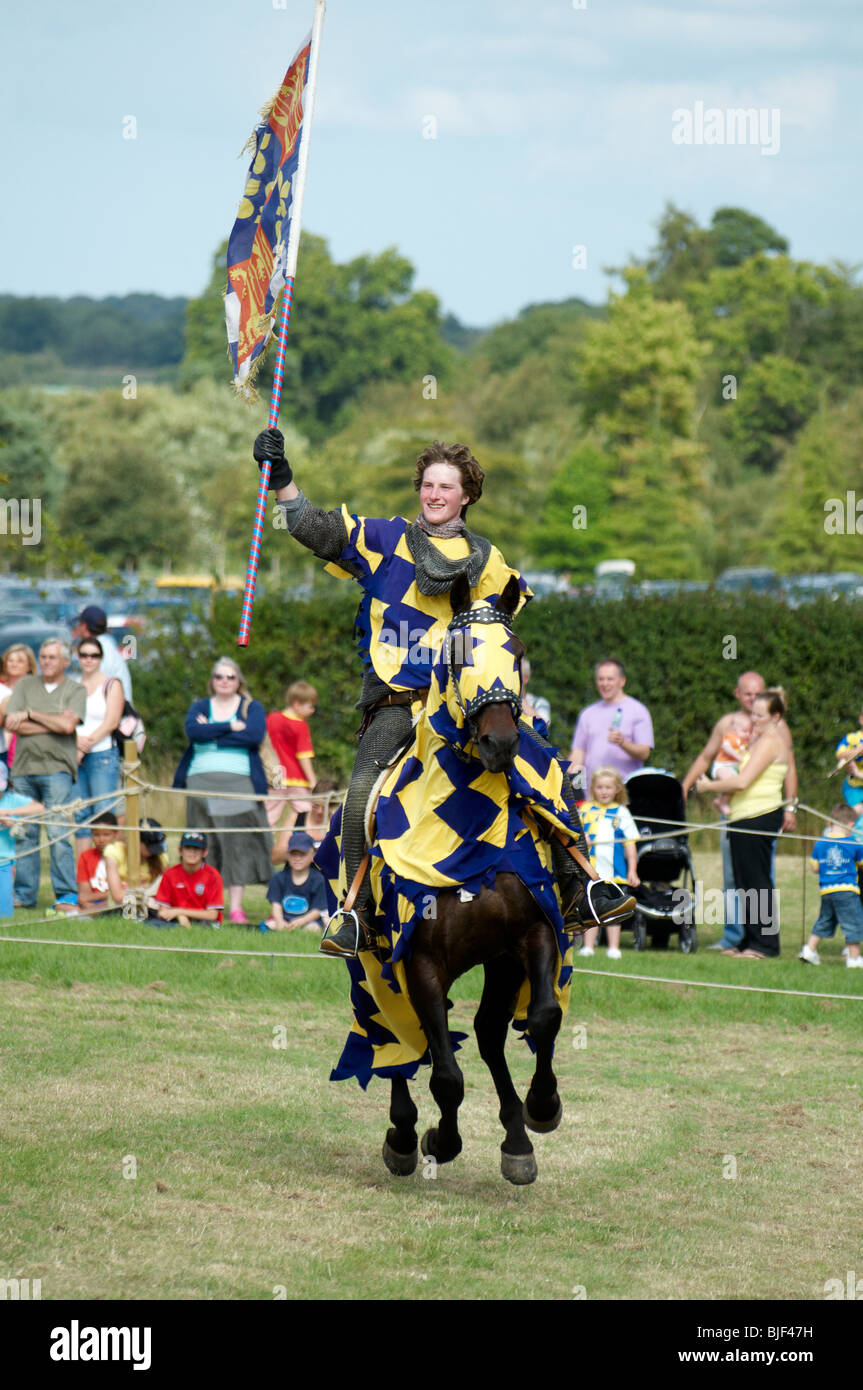A man in a medieval Knight costume on a horse Stock Photo Alamy