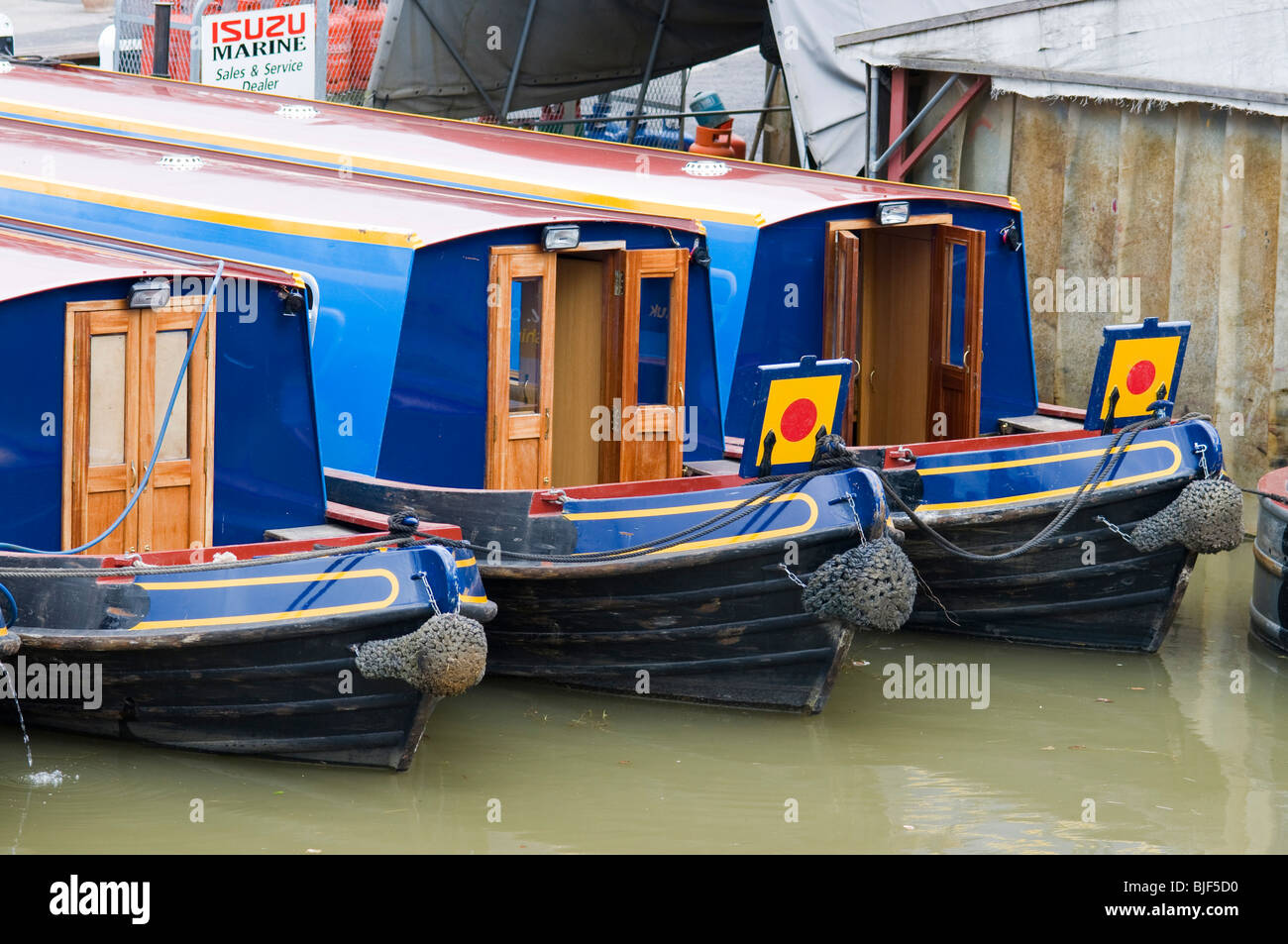 Narrowboats being prepared for hire at Heyford wharf on the Oxford canal Stock Photo