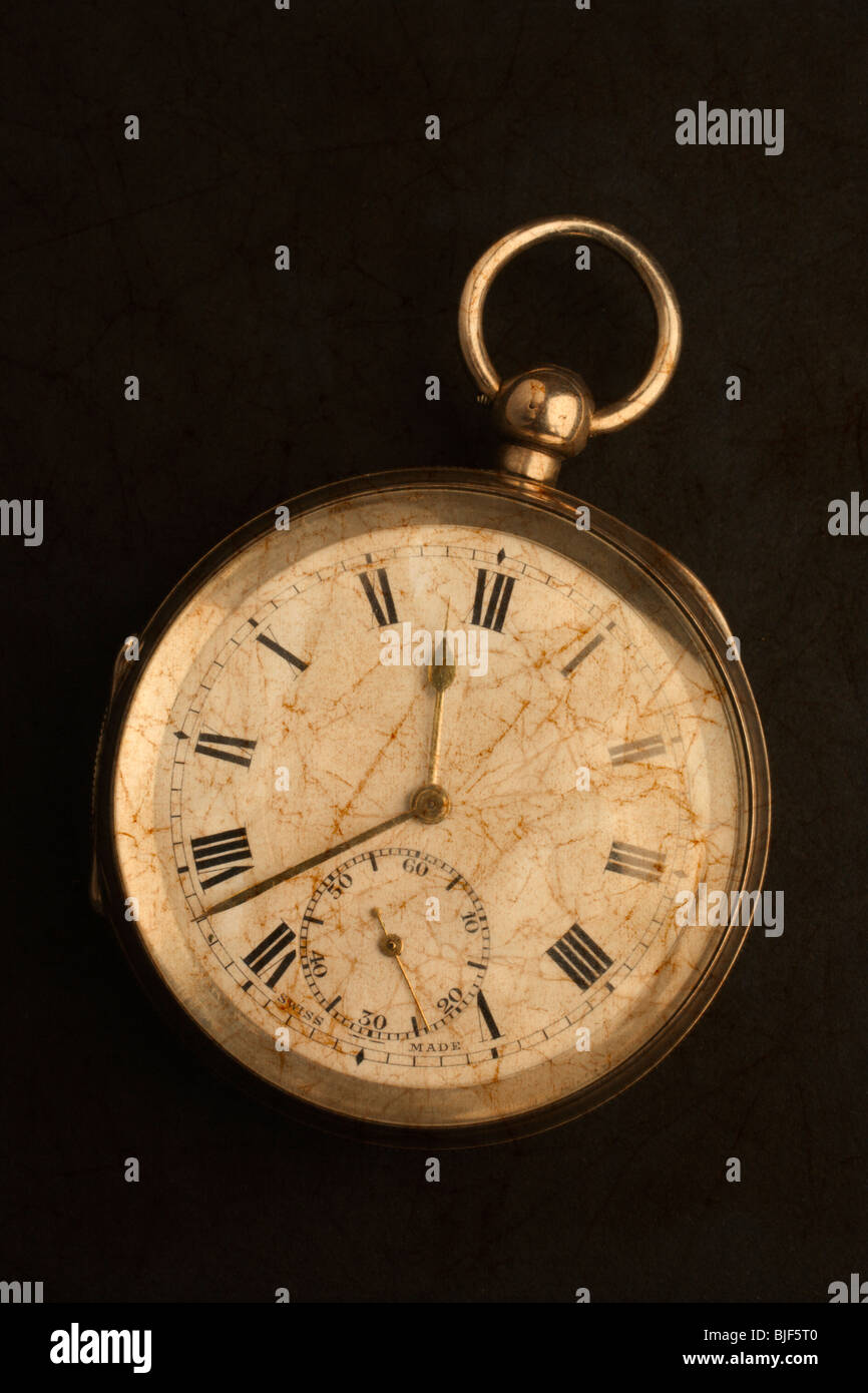 An old gold pocket watch. Stock Photo