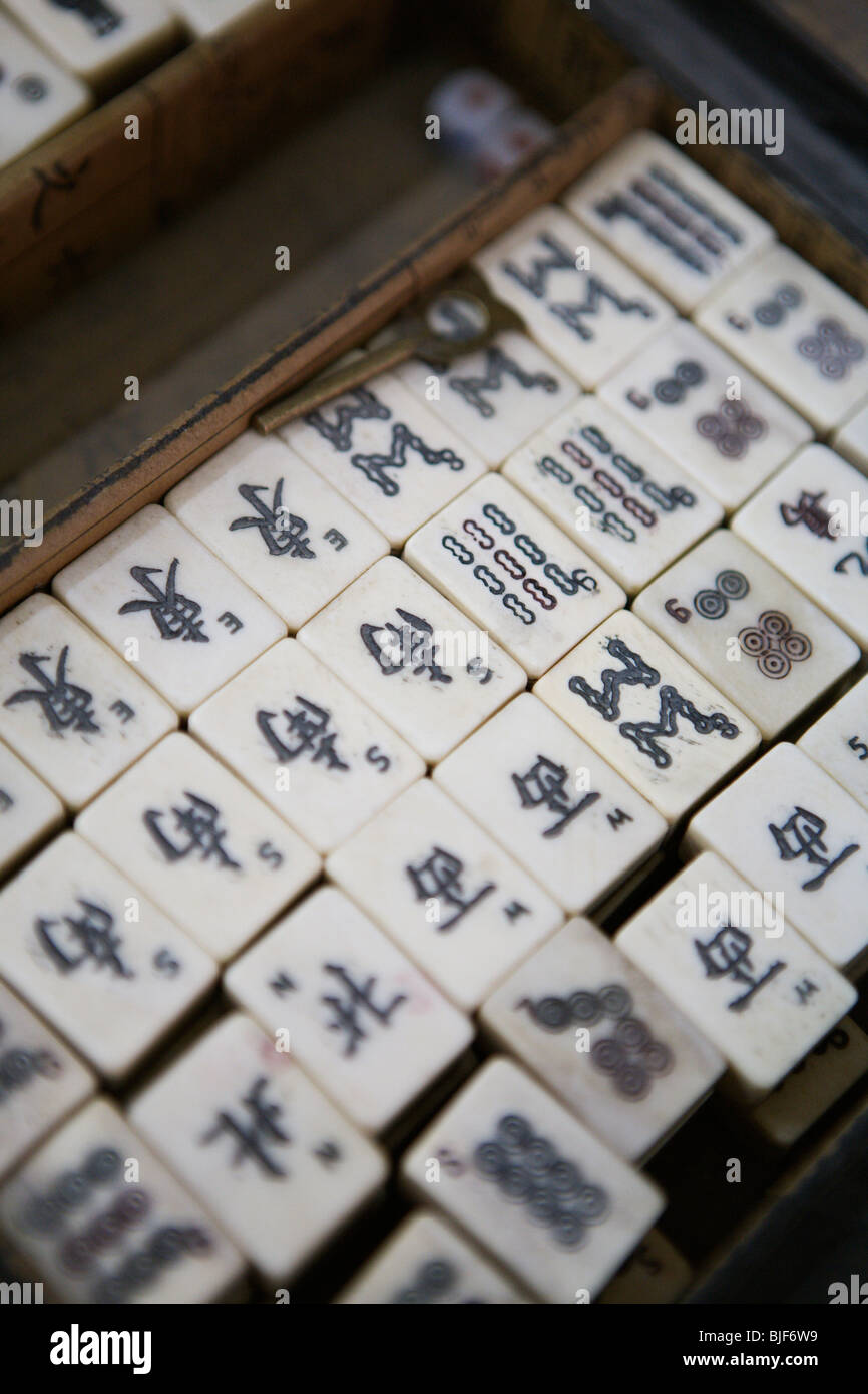 Mahjong game is sort of card game with dominoes. Beijing, China. Stock Photo