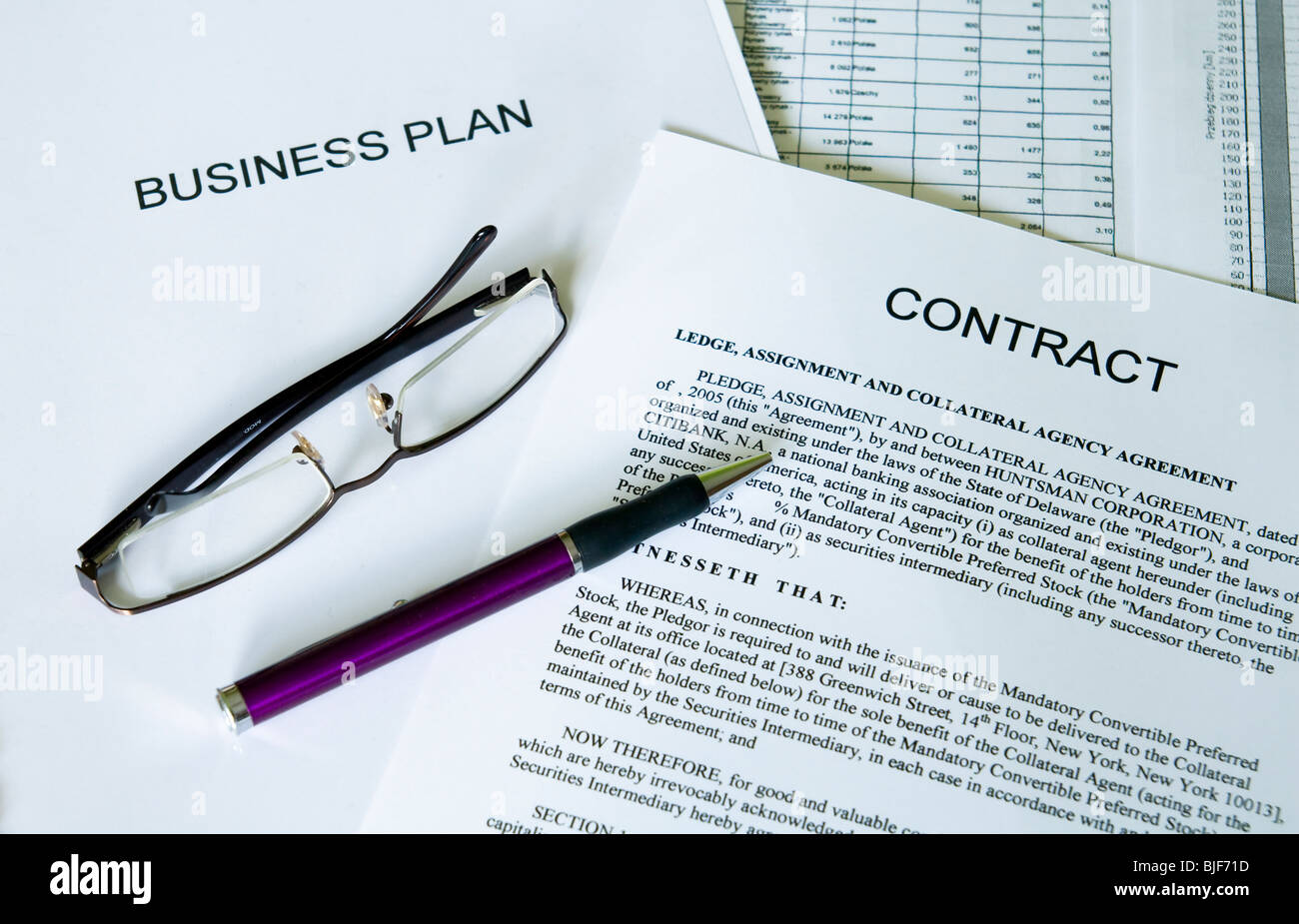 selective focus image of business plan, contract, ballpoint pen and glasses Stock Photo