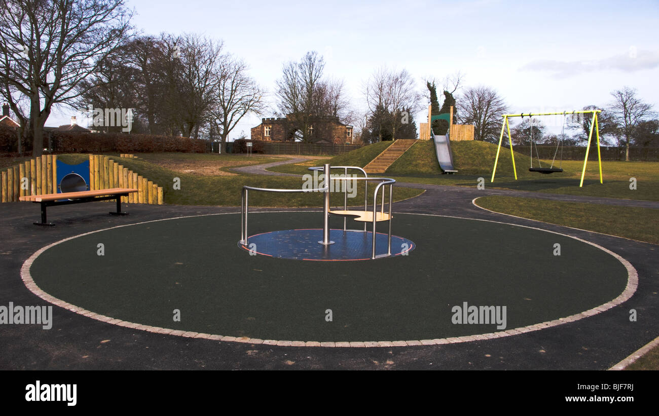 Swing roundabout slide british english nobody hires stock photography