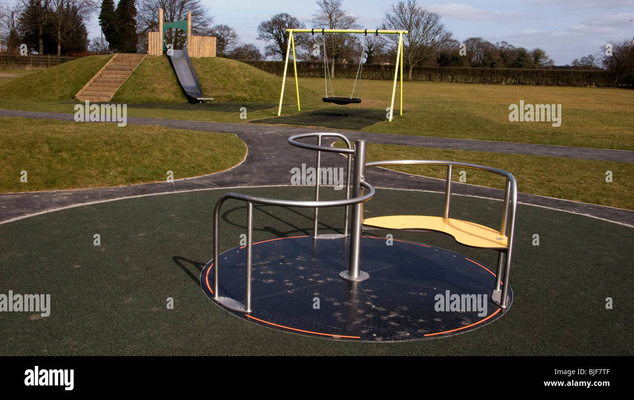 Swing roundabout slide british english nobody hires stock photography