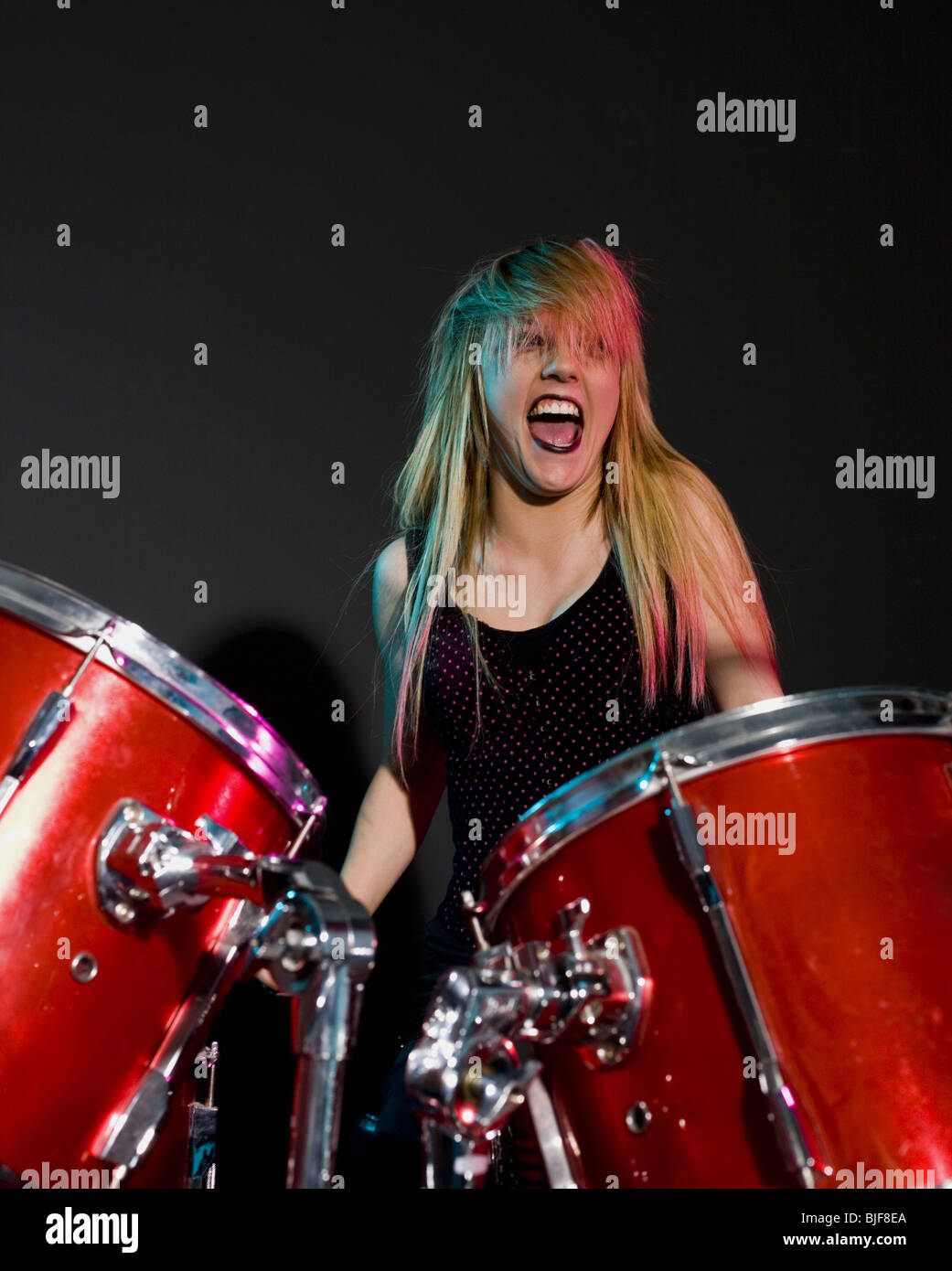 rocker girl on the drums Stock Photo Alamy
