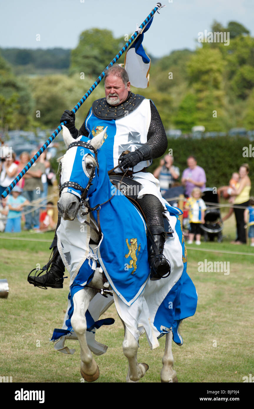 A man in a medieval Knight costume on a horse Stock Photo Alamy