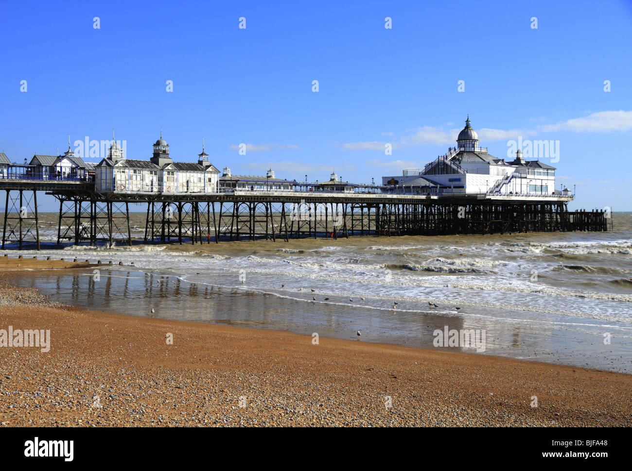 Looking East on Eastbourne beach towards the pier. Stock Photo