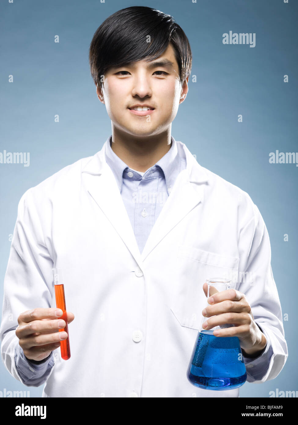 scientist holding test tubes Stock Photo Alamy