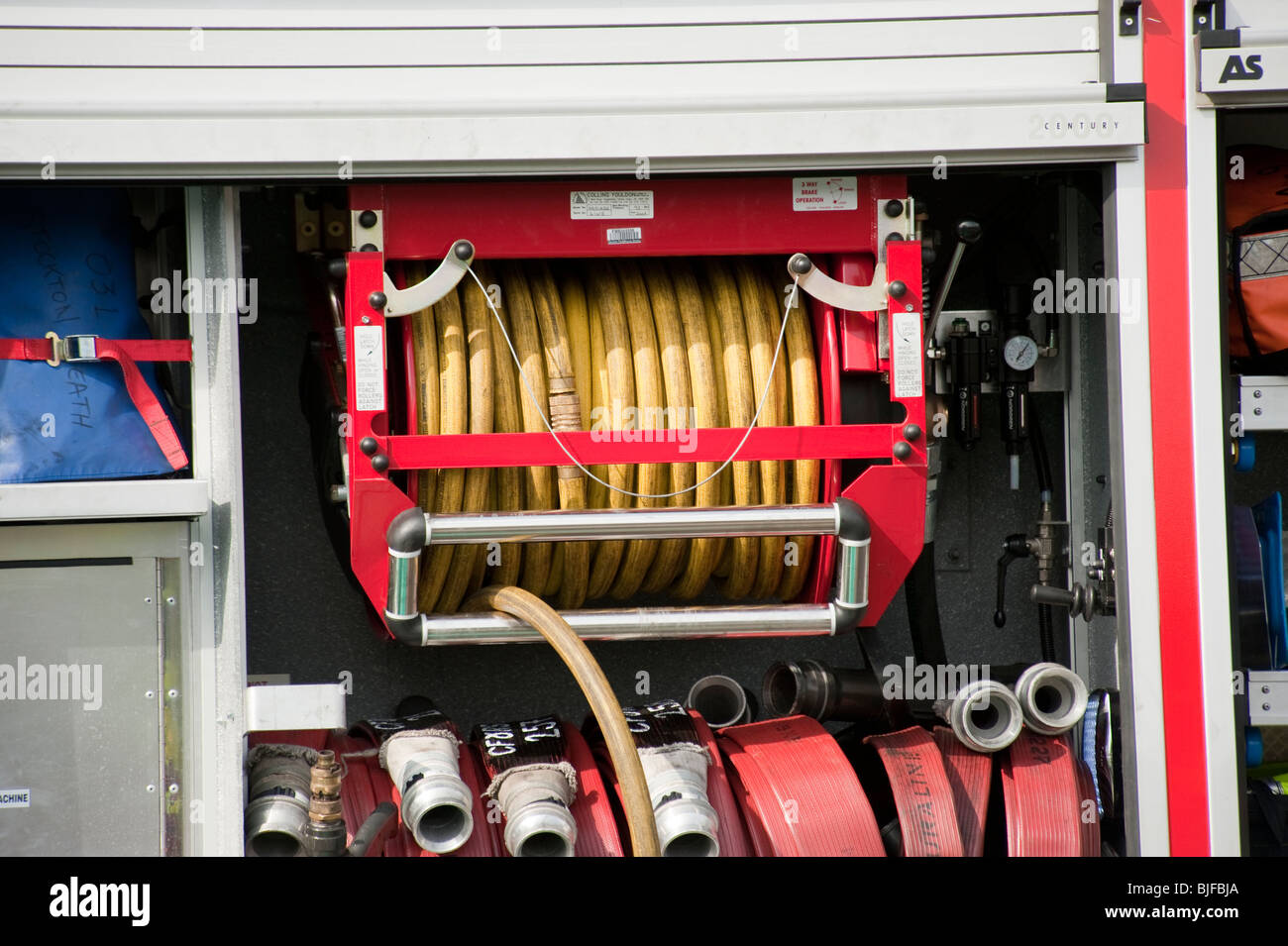 Fire engine hosereel and 70mm hose Stock Photo