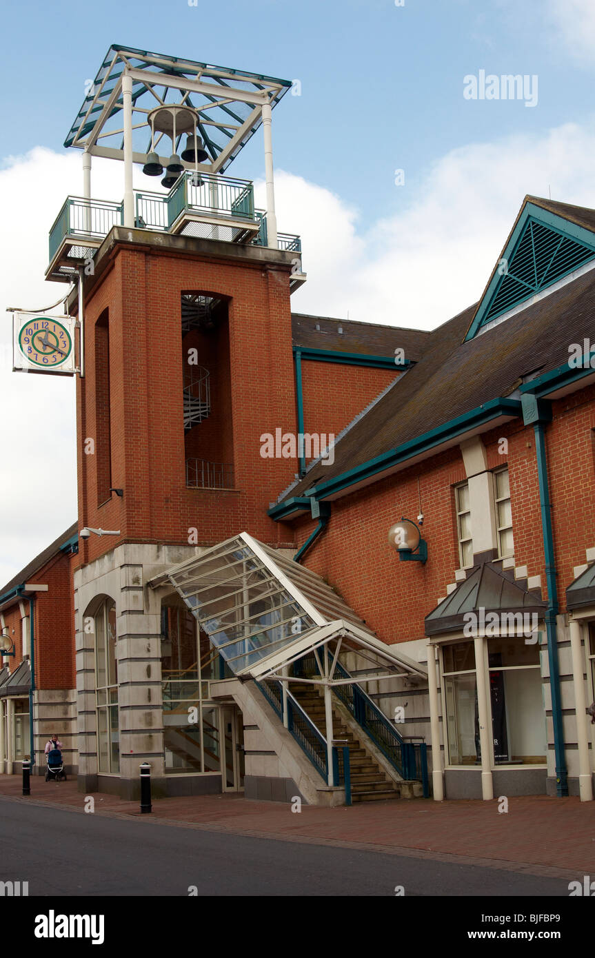 Side entrance to the Brooks shopping centre in Winchester, Hampshire showing architectural features of tower and clock. Stock Photo