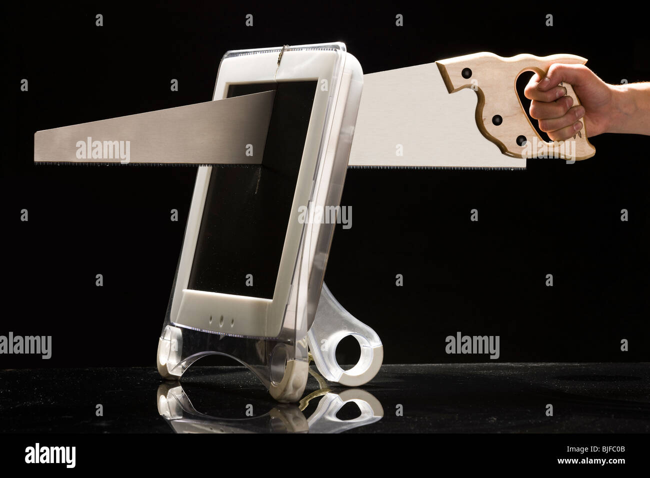 saw cutting a computer monitor Stock Photo Alamy