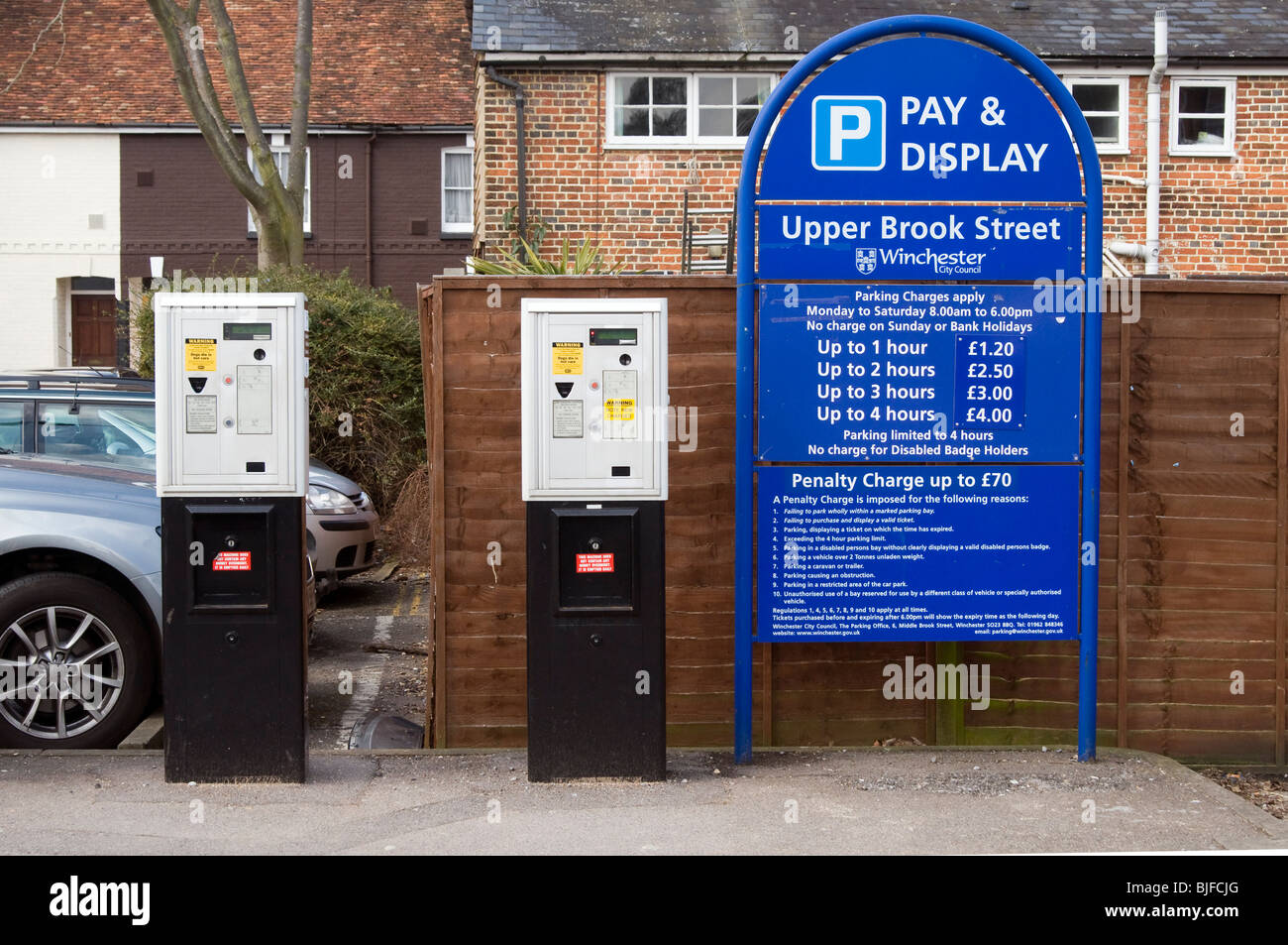 Pay and Display car park sign and ticket machines, Upper Brook Street
