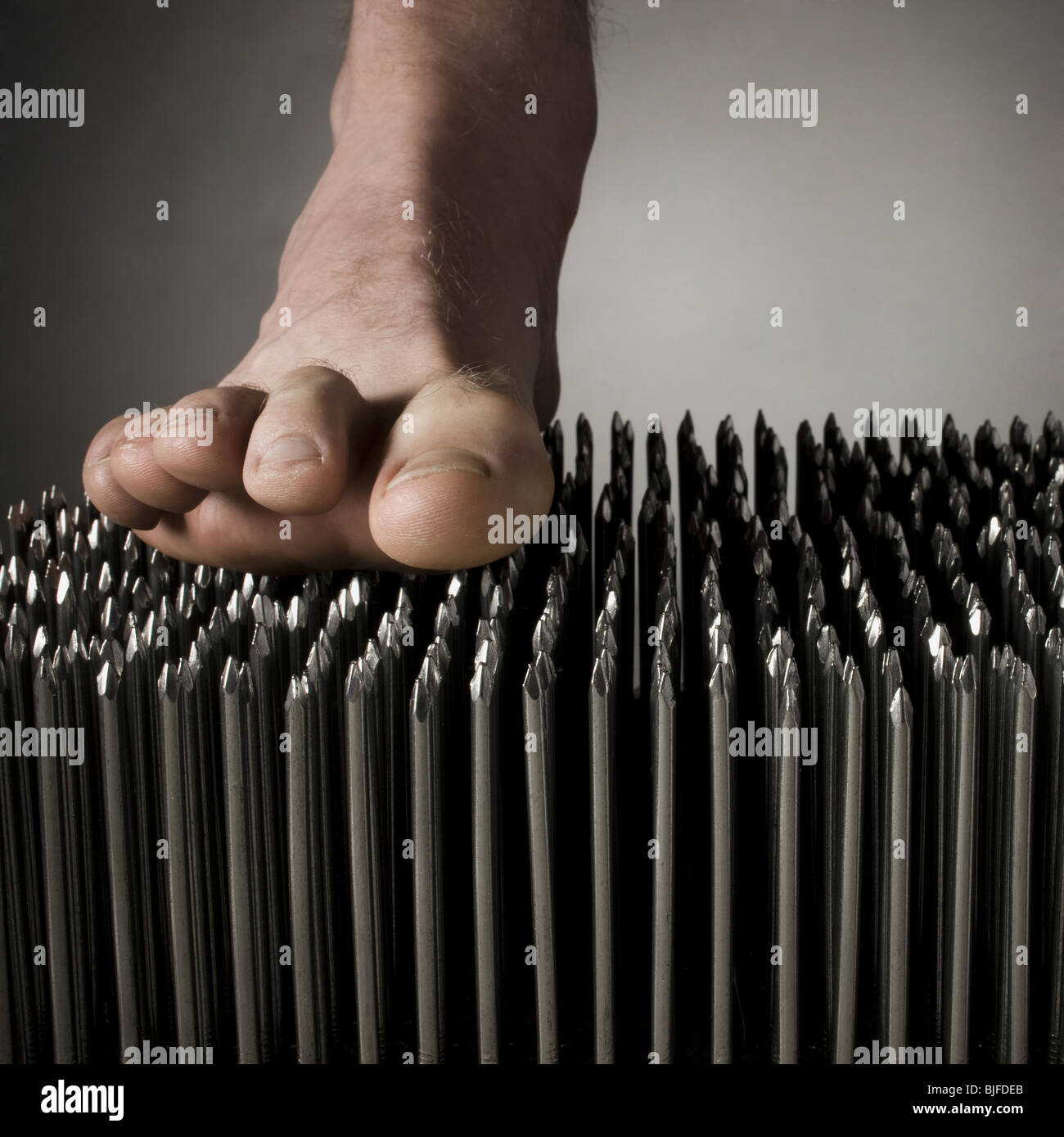 Walking on nails hi-res stock photography and images - Alamy