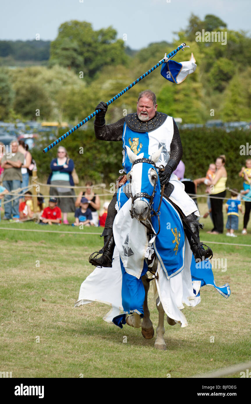 A man in a medieval Knight costume on a horse Stock Photo - Alamy