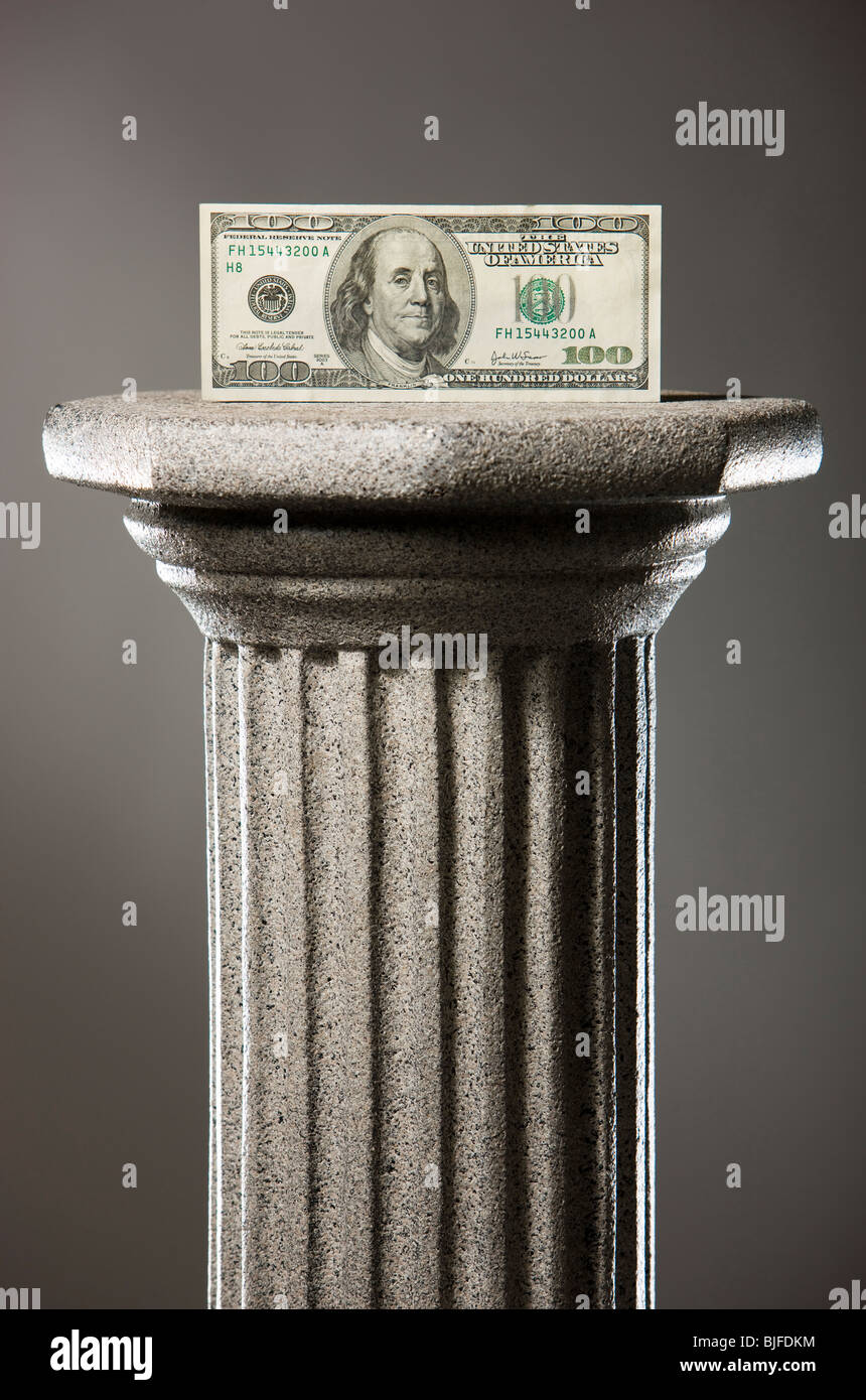 money on a pedestal Stock Photo