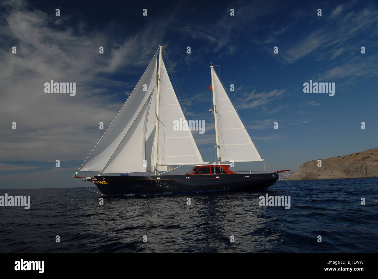 beautiful blue sailboat on sailing at the Mediterranean  sea Stock Photo