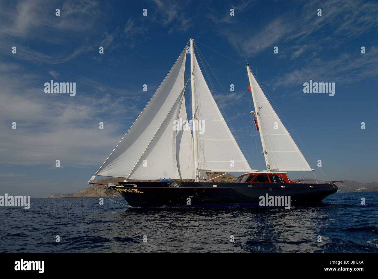 beautiful blue sailboat on sailing at the Mediterranean  sea Stock Photo