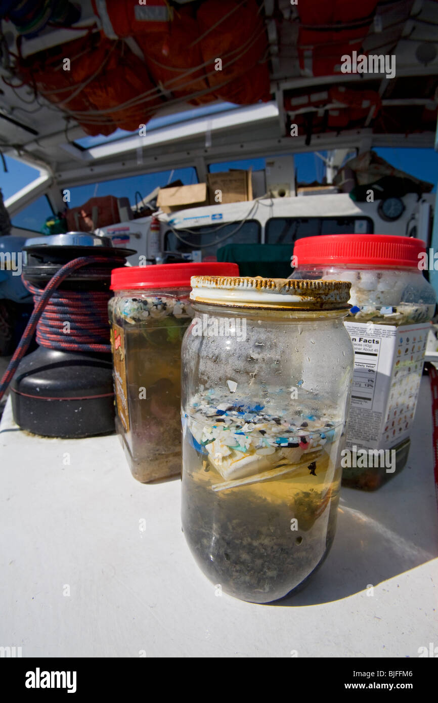 Plastic sample jars taken from trawls from the “great Pacific garbage patch'.  Long Beach, California, USA Stock Photo