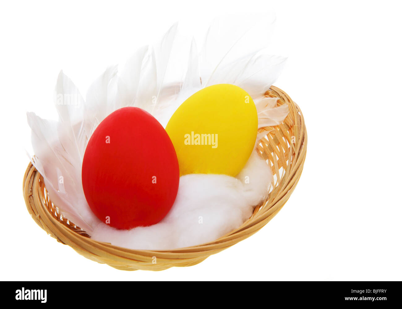 Easter eggs with feathers isolated on white background Stock Photo - Alamy