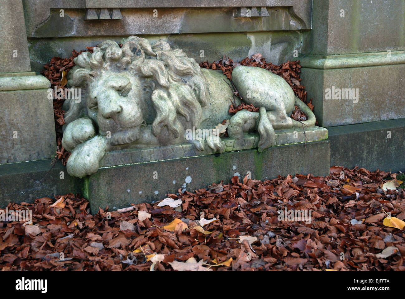 Statue of a sleeping lion in the Dean Cemetery Edinburgh, Scotland